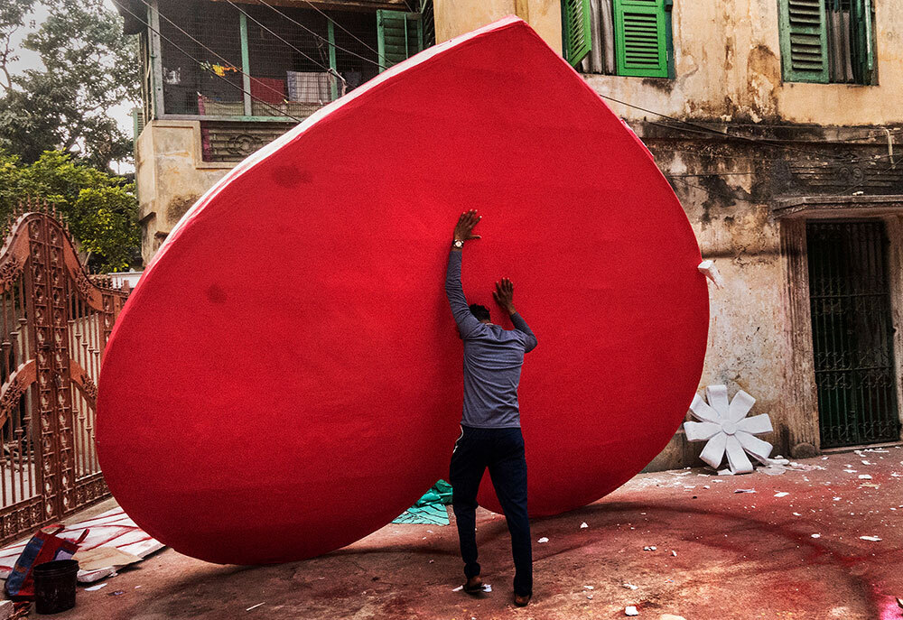 An artist prepares a Valentine’s Day decoration in Kolkata, India. Hindu nationalists in the country have often protested against the holiday as an invasion of amoral Western influence.