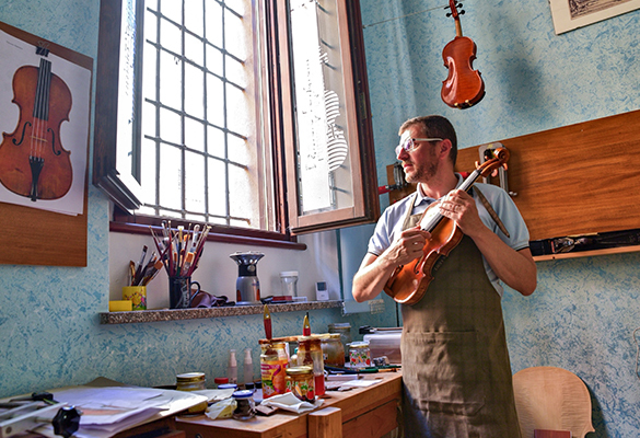 Violin maker Daniele Tonarelli is one of more than 150 luthiers based in Cremona. Although the COVID-19 pandemic hit this Italian city hard, a new music conservatory may help revive the economy and bring tourists back.