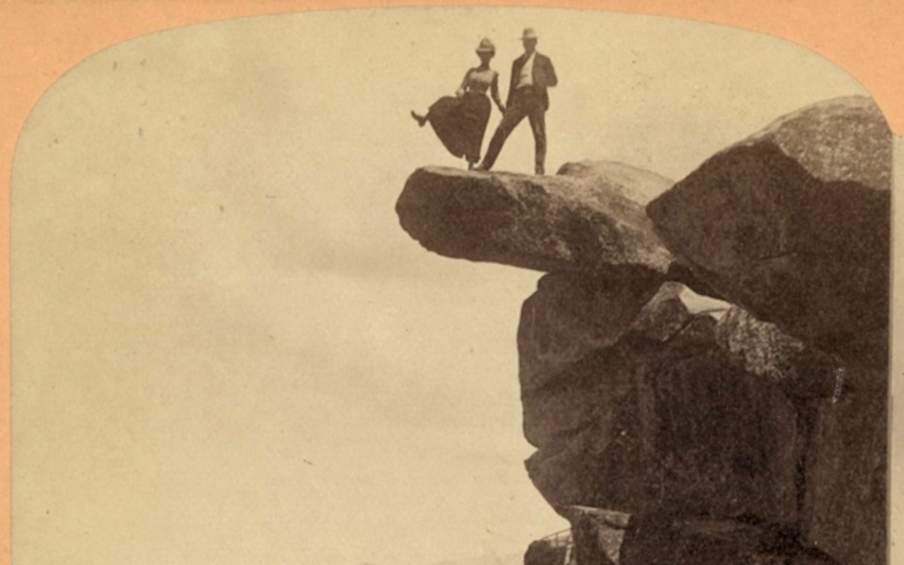 Visitors brave the edge of Overhanging Rock at Glacier Point in Yosemite National Park.