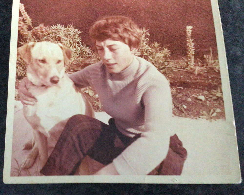 The author of the poem "Rainbow Bridge," with her dog