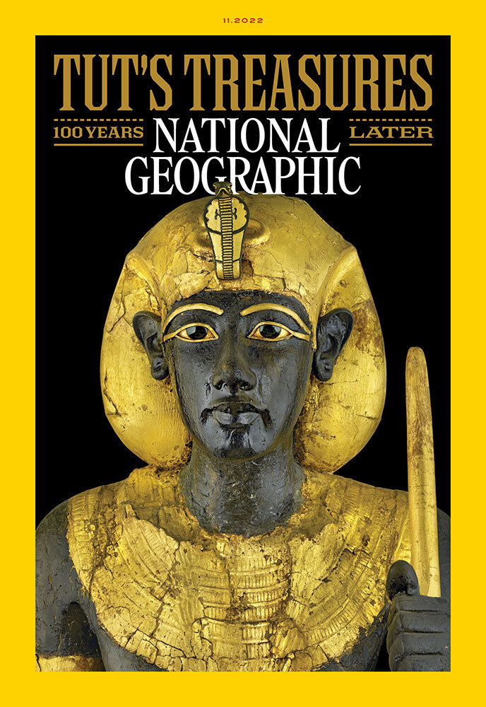 The cover of National Geographic magazine with a portrait of a statue of King Tut