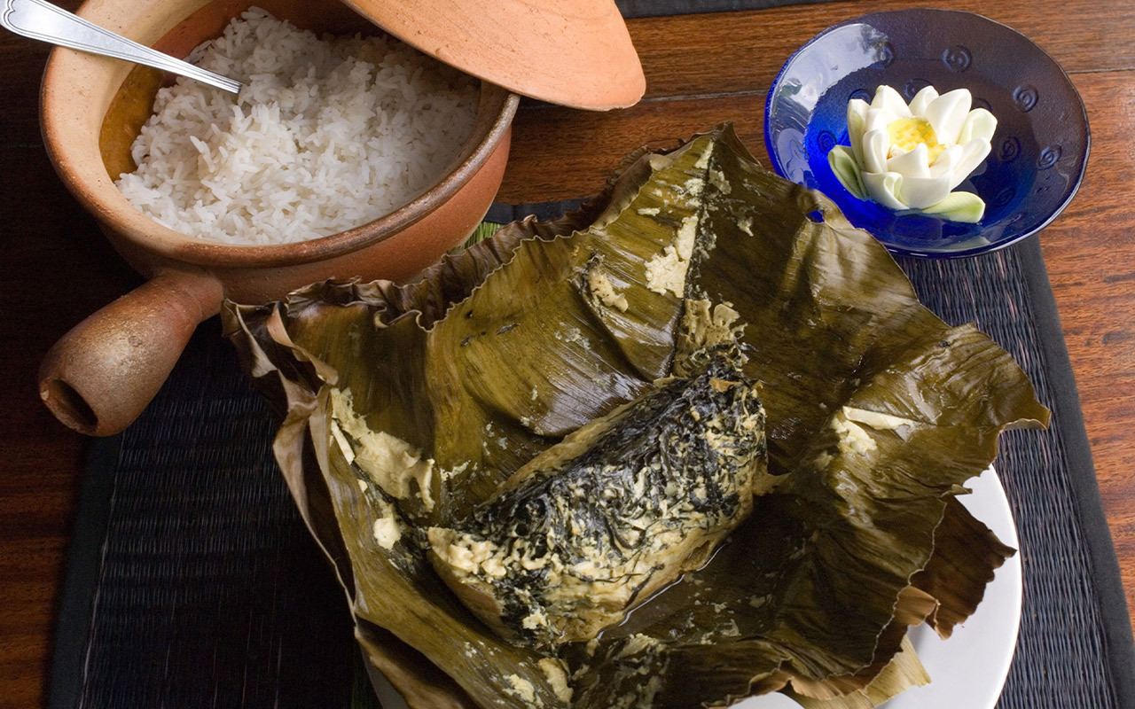 Fish amok—Cambodia's national dish—is a steamed fish in a sweet curry sauce often served in a banana leaf with a side of rice.