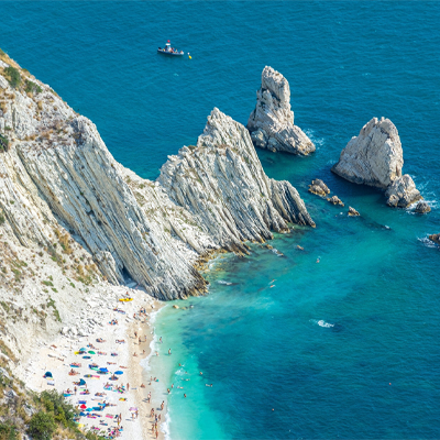 In Sirolo, Spiaggia delle Due Sorelle Beach (Two Sisters Beach) is just one of 16 beaches in Le March designated as a Blue Flag beach, recognized for its high environmental standards and cleanliness. 