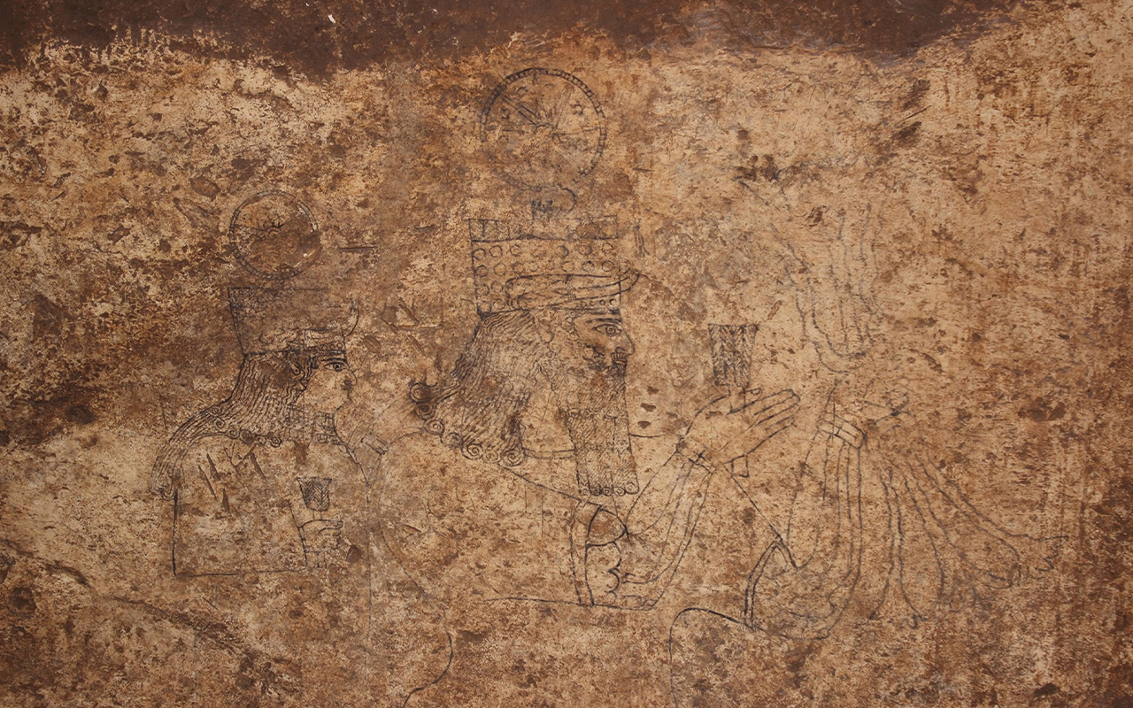 The ghostly profiles of ancient gods emerge from a ca. 3,000-year-old rock carving in Turkey.