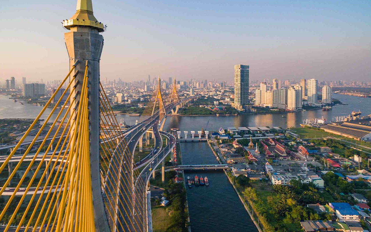 The Bhumibhol suspension bridge spans Bangkok, Thailand’s Chao Phraya River. The historic neighborhoods on its banks are experiencing a creative and commercial renaissance.