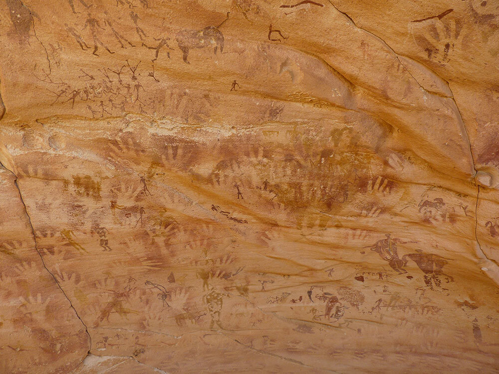 hand prints on a cave