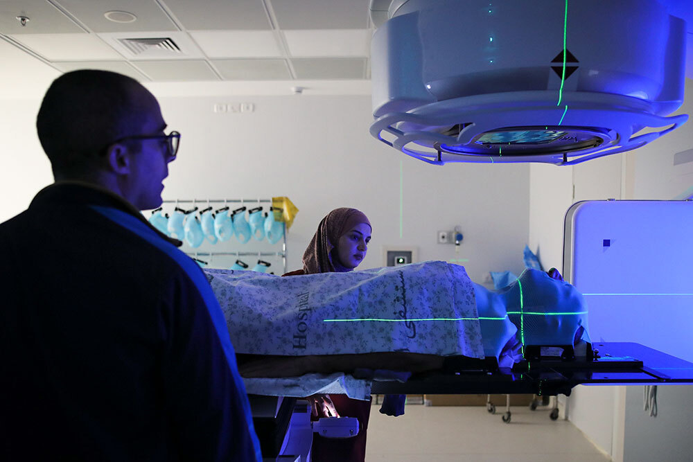 A picture of someone receiving radiation therapy