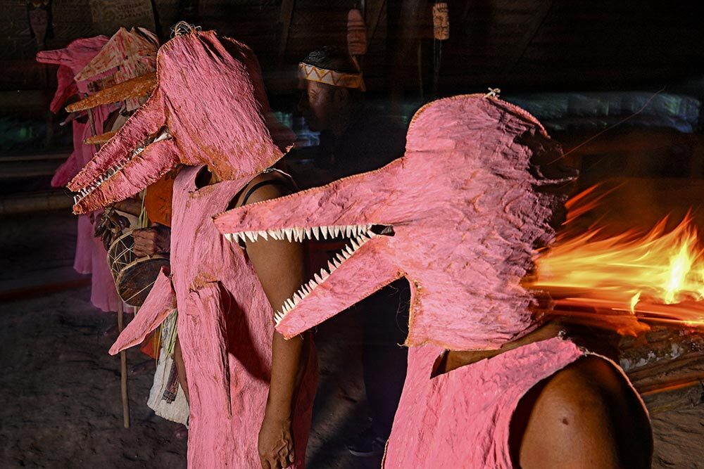 A dance in the Colombian Amazon, with women dancing as pink dolphins, considered mischievous spirits and guardians of the water.