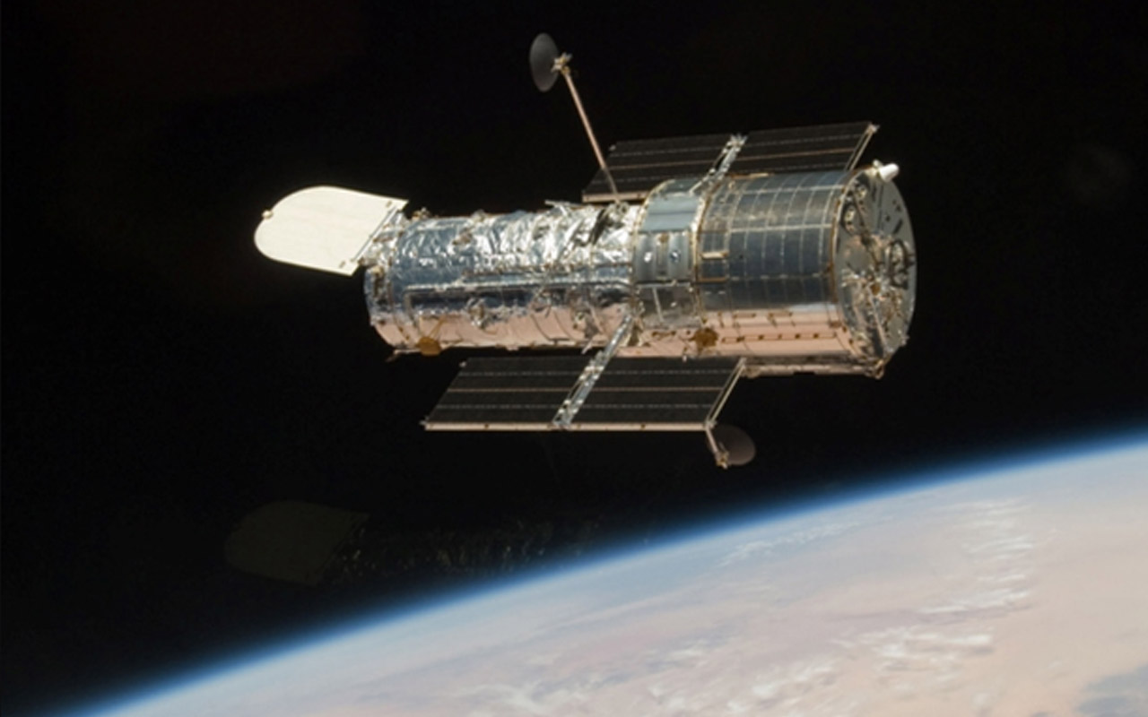 By using the gravity of a large cluster of galaxies as a magnifying glass, the Hubble Space Telescope has spotted the most ancient star known.
