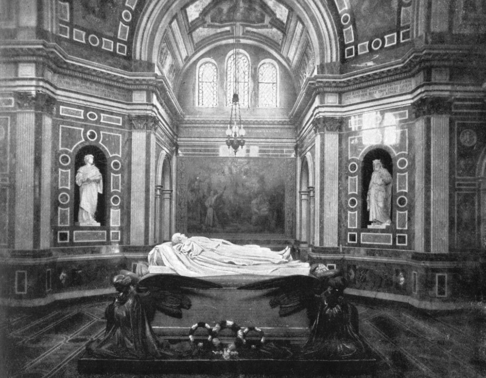 A black and white image of a mausoleum