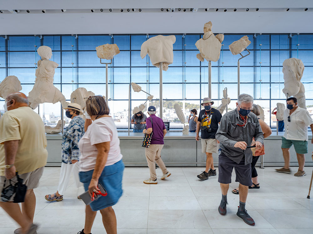 Tourists in a Greek museum