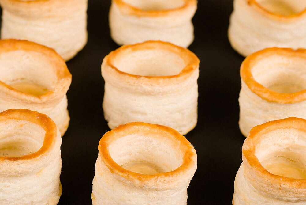 Rows of cylindrical pastries.