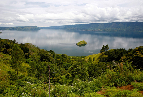 Some 74,000 years ago, the largest volcanic eruption of the last two million years rocked the island of Sumatra. The 60-mile-wide caldera formed in the explosion is now a large volcanic lake.