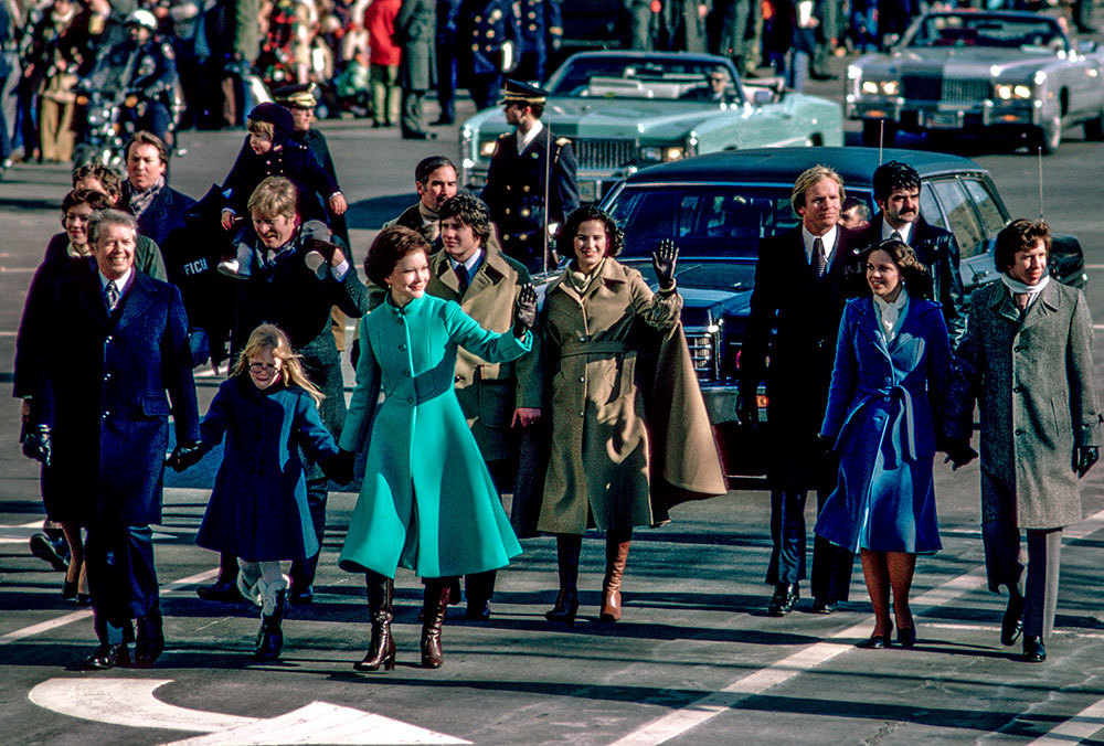 The Carter family walking down Pennsylvania Avenue after his inauguration