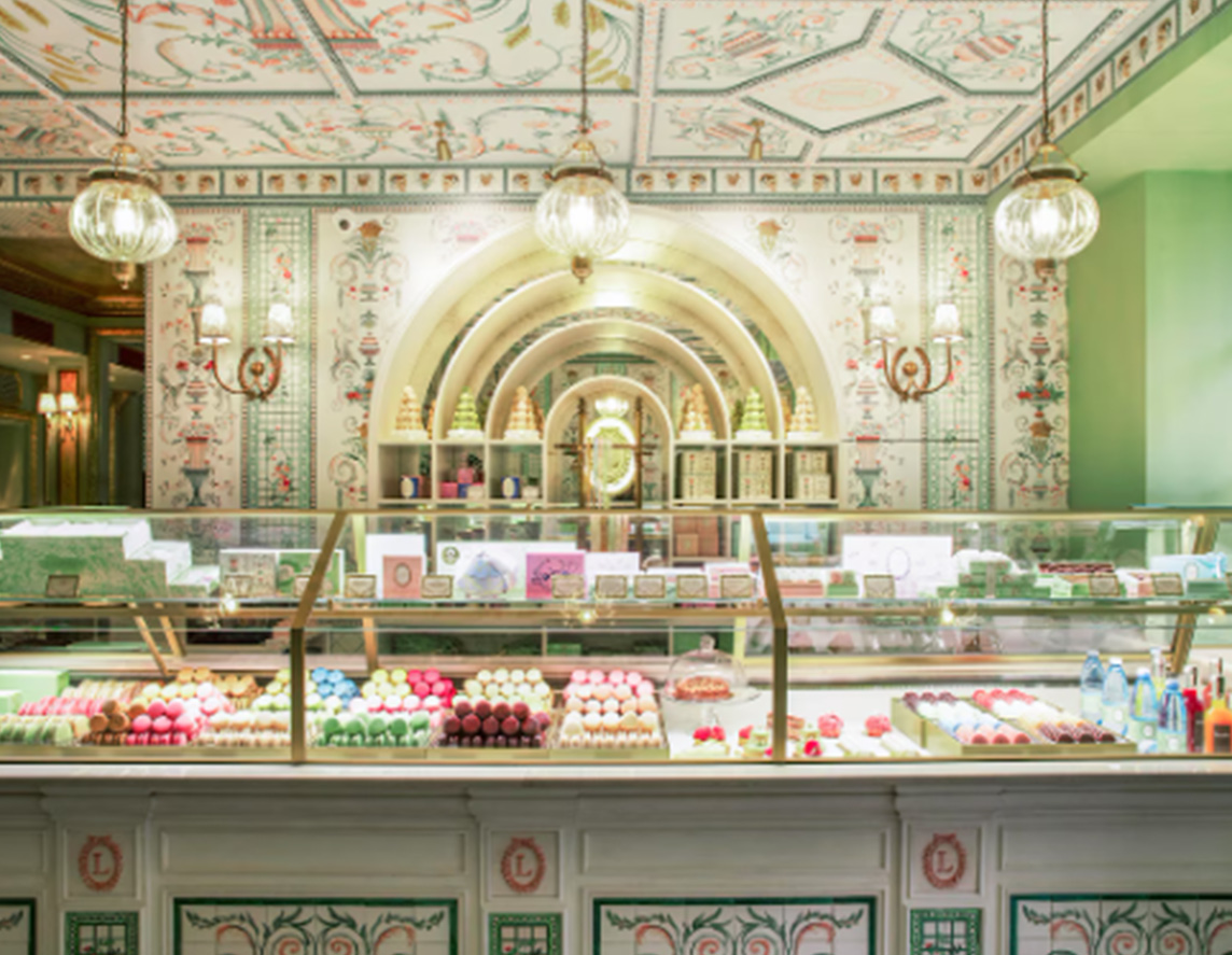 a patisserie display selling french macarons