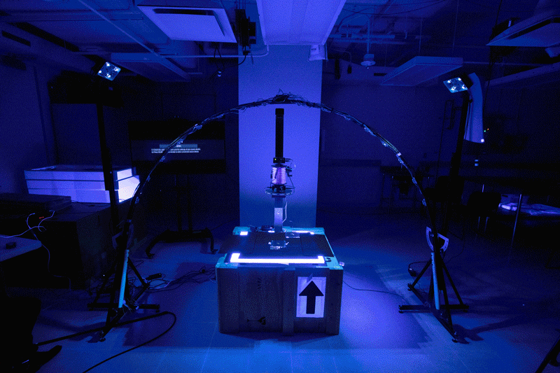 This machine, with its flashing multicolored lights, helps measure the surfaces (and authencity) of purported artifacts