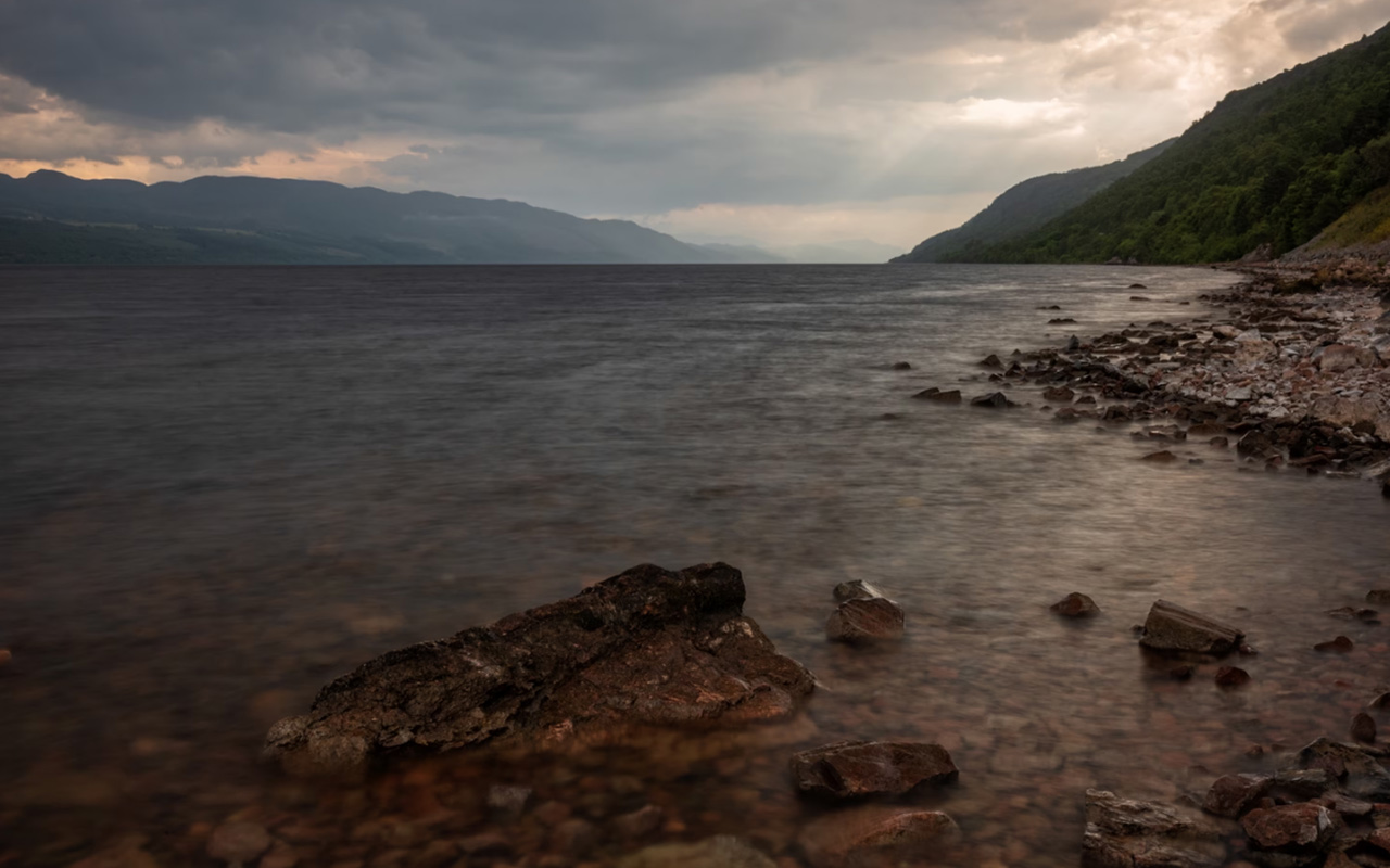 Loch Ness, a deep freshwater lake in northern Scotland, is one of several destinations that draws tourists with rumors of cryptids, or mythical creatures.