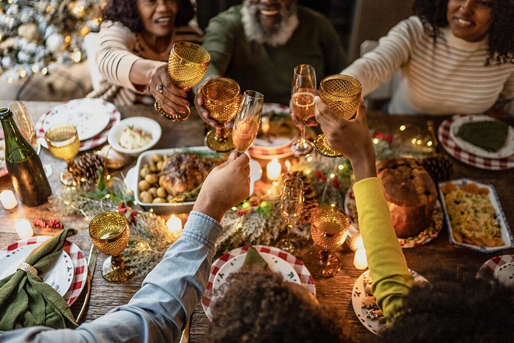 A family toasts before a holiday dinner.