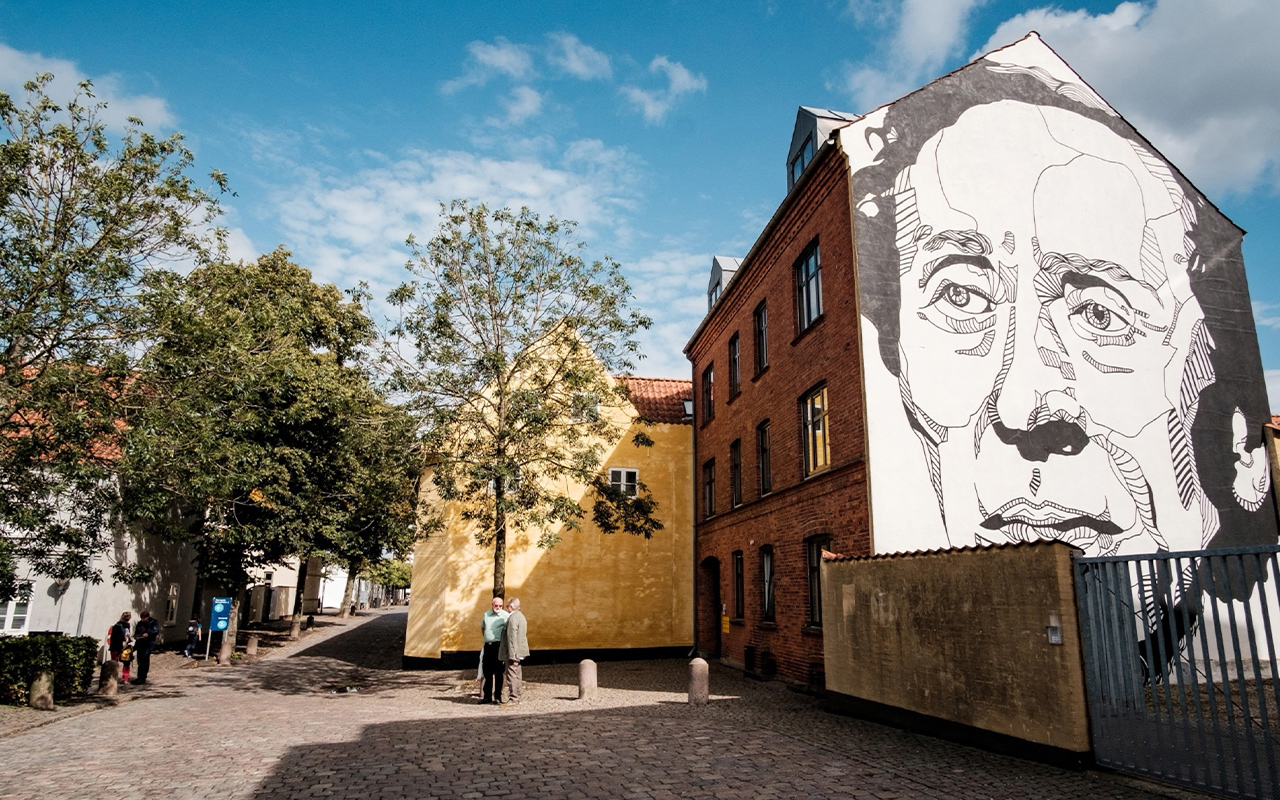 A mural of writer Hans Christian Andersen, by artist Don John, decorates a house on Bangs Boder Street in Odense, Denmark.