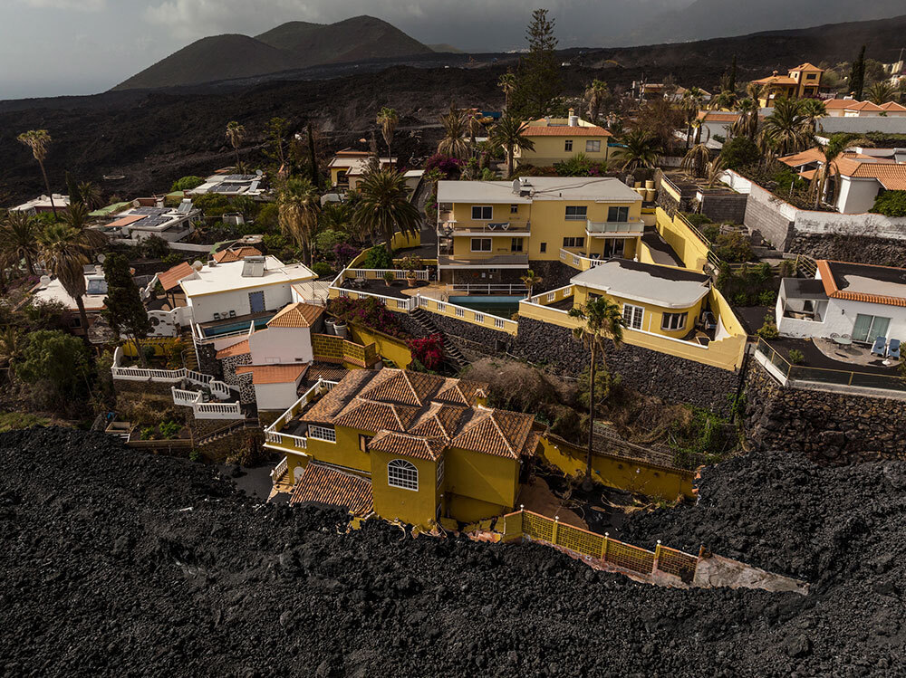 A river of lava passed by a group of houses