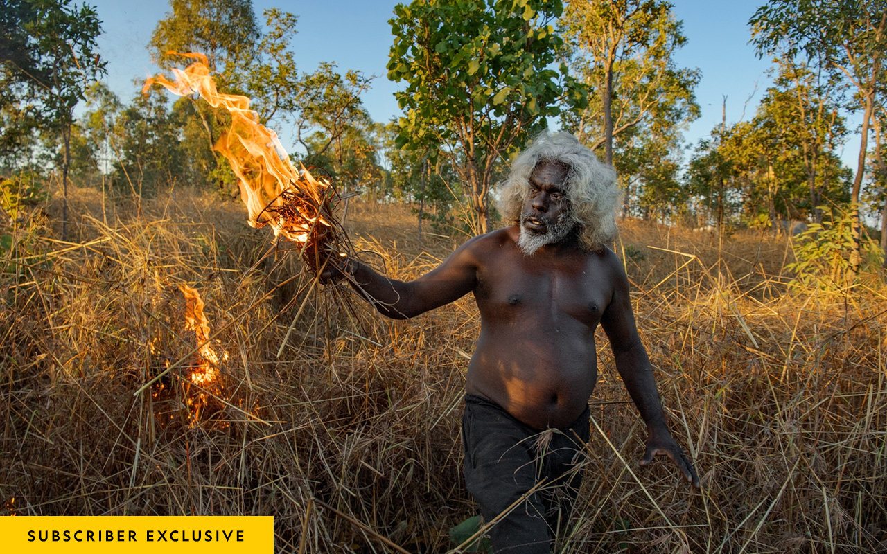 Conrad Maralngurra starts a low-intensity blaze to protect his community in Mamadawerre, an outstation along the northern border of the Warddeken Indigenous Protected Area.