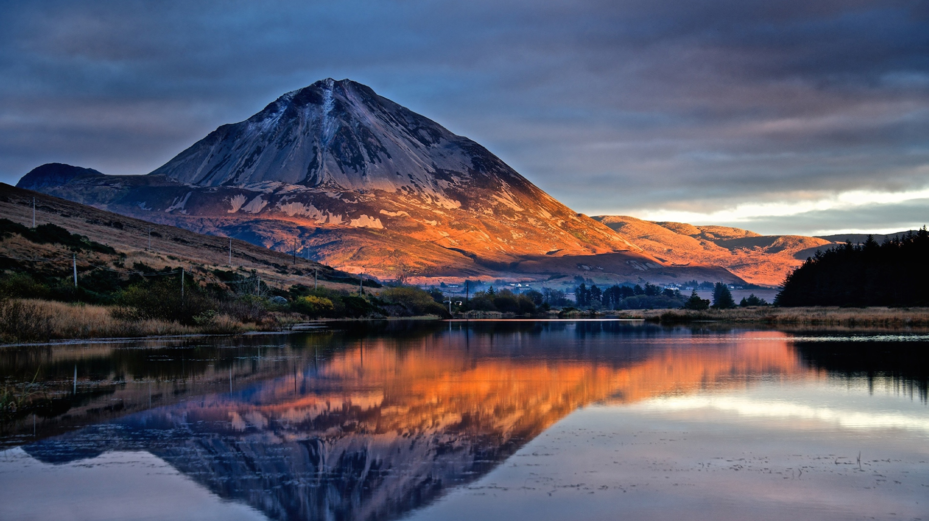 A classic view of autumn hues on Donegal's most iconic peak, Mount Errigal, which can be readily climbed in two hours.