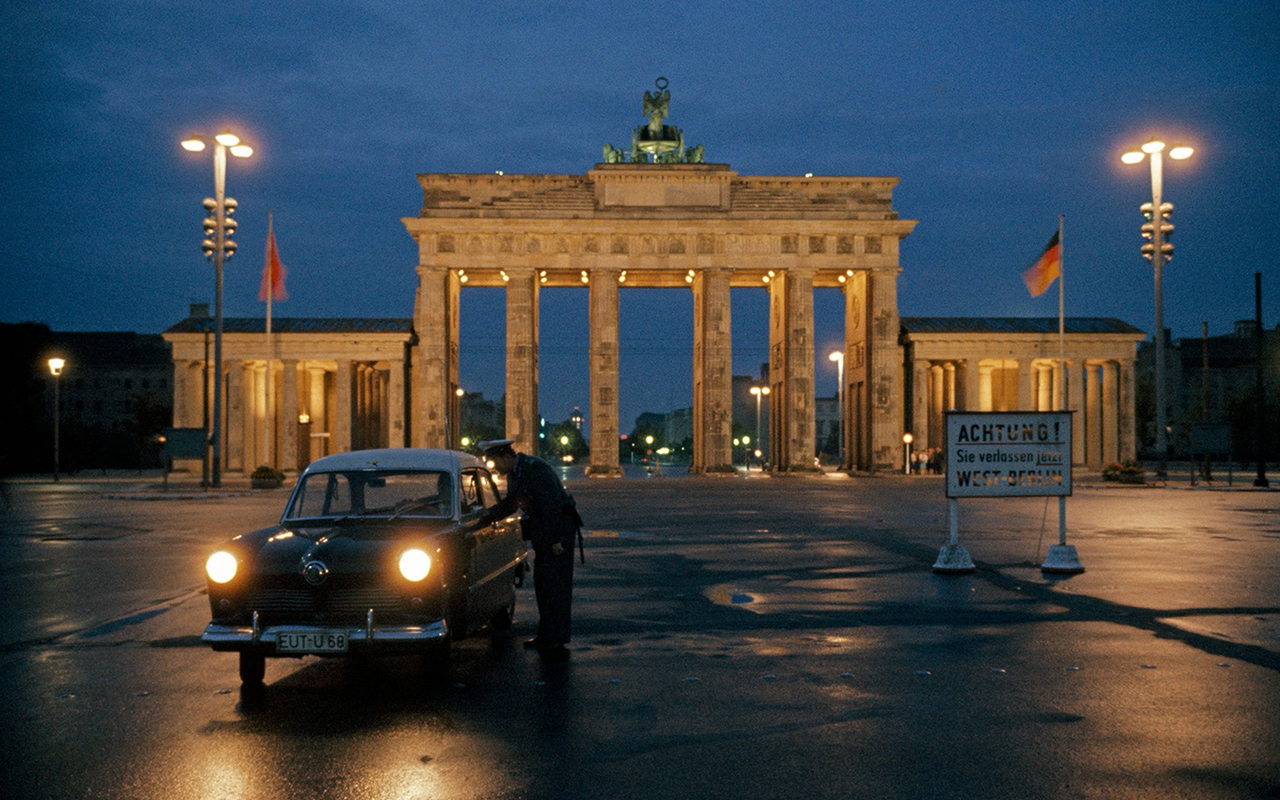 “Attention! You are now leaving West Berlin,” warns the sign in this picture, taken in front of the city’s famed Brandenburg Gate in 1961, on the eve of the border closing. This photograph appeared in the December 1961 issue of National Geographic magazine.