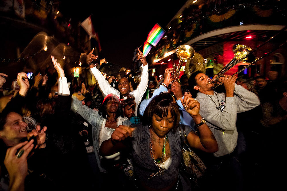 People having a good time pack the streets of New Orleans, Louisiana during Carnival a few days before Mardi Gras in 2010.