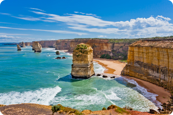 Take in the picturesque natural wonder of the Twelve Apostles as you travel along Great Ocean Road.