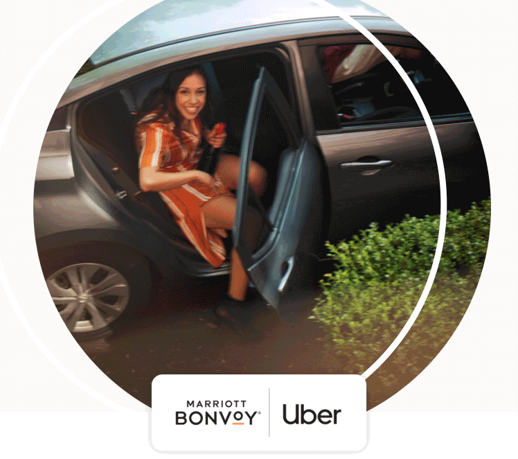 A rideshare passenger arrives at her hotel.