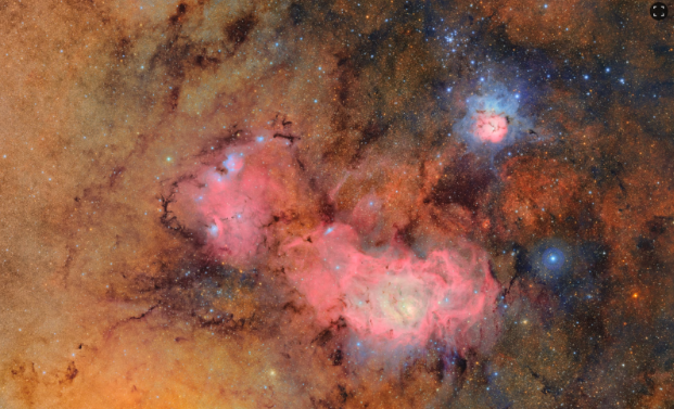 In this immense image, the Vera C. Rubin Observatory offers a brand new view of the Trifid Nebula and the Lagoon Nebula. 