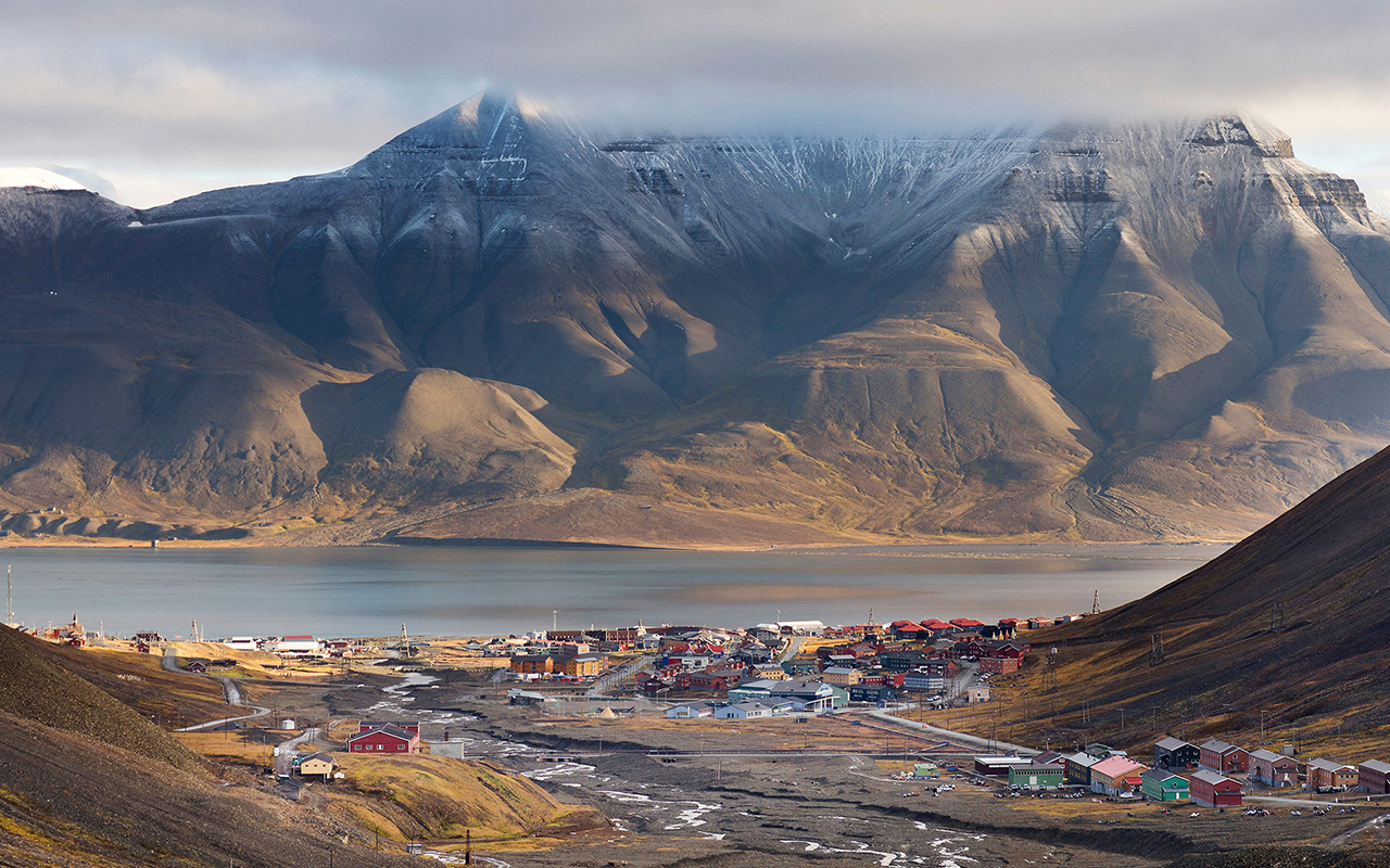 Longyearbyen (pictured) and Ushuaia are at opposite ends of the Earth, but have striking similarities. 