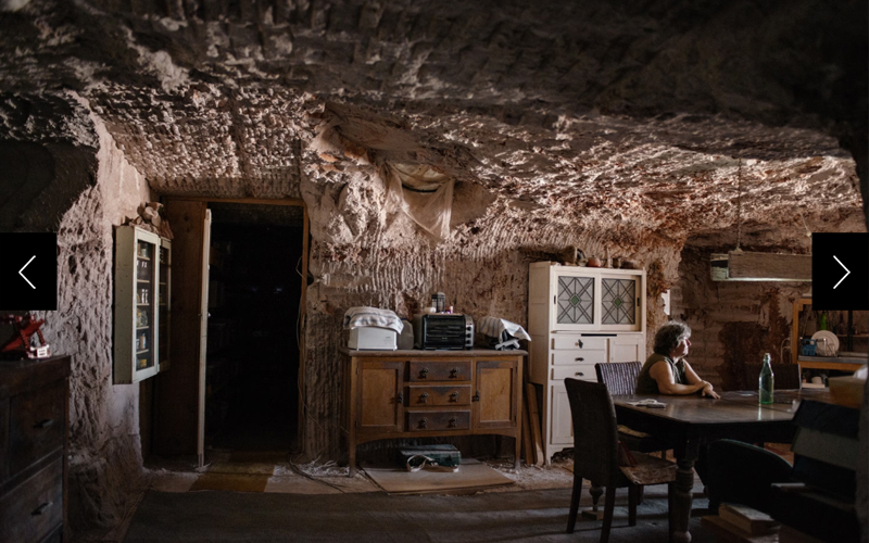 Gabriele Gouellain waits in the kitchen of her subterranean home for her husband to return from the opal mines around Coober Pedy, in South Australia.