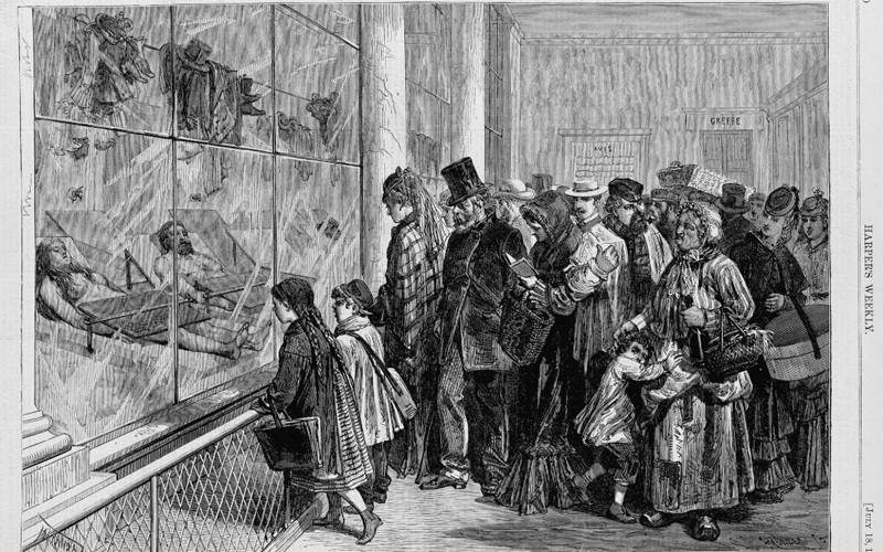 This  1874 illustration from Harper’s Weekly called “The Morgue at Paris: The Last Scene of a Tragedy” shows how the Paris Morgue put unidentified bodies on public display—drawing crowds of curious onlookers behind the glass.