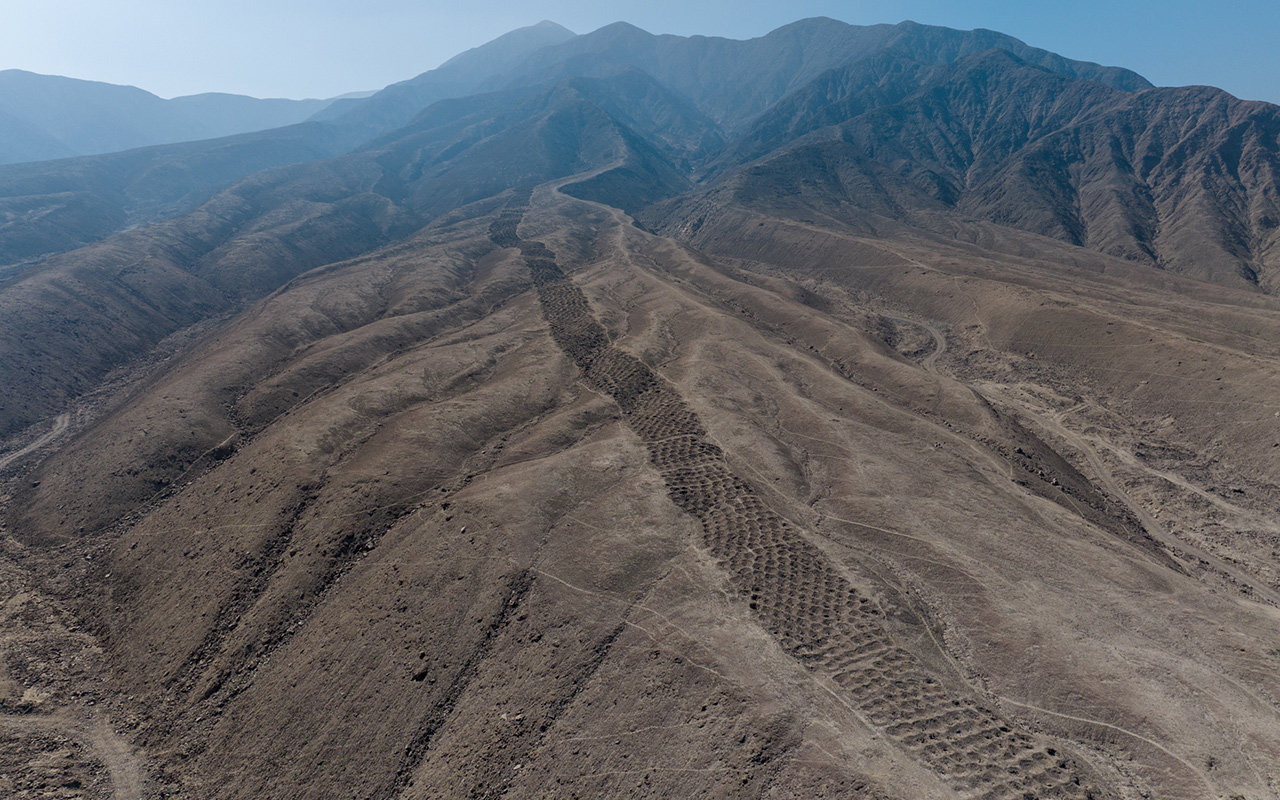 A drone shot drones at the 'Band of Holes' along Monte Sierpe.