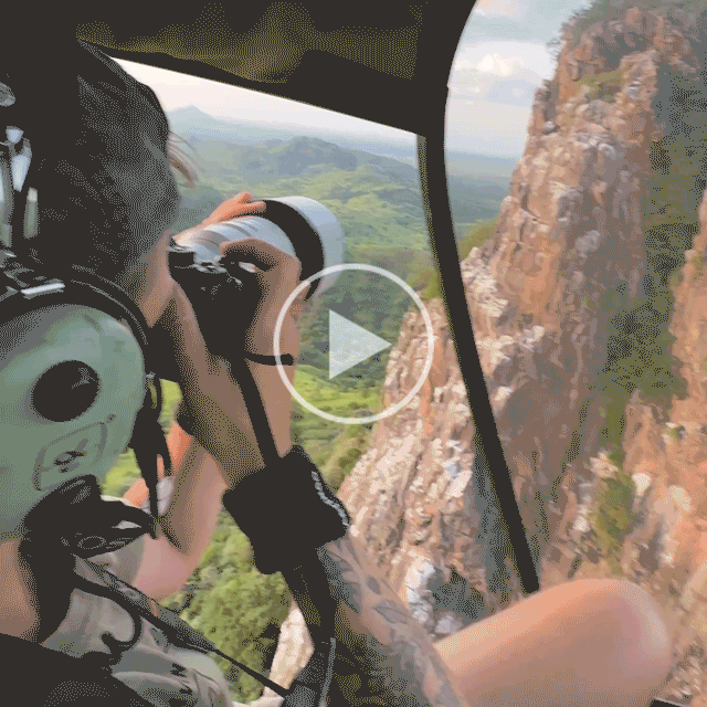 Photographer Marcus Westberg photographs from a helicopter