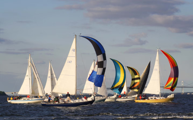 A photograph of a handful of sailboats on the water off  Kent Island.