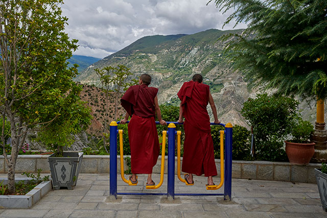 Young Buddhist monks use muscles as well as meditation during their stay at the Dongzhulin Monastery in the mountainous northwest of Yunnan, China.