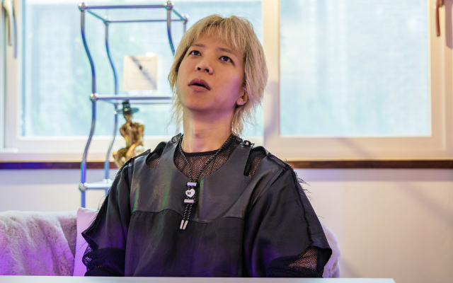 Byung-jin Park, a 36-year-old punk musician and entrepreneur, remains still during Seoul’s 2025 Space-Out Competition.  