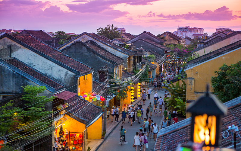 Pedestrians stroll through the old town in Hội An, Vietnam. A river trading port from the 15th through 19th centuries, it’s one of many destinations around the globe that ban or severely limit cars.
