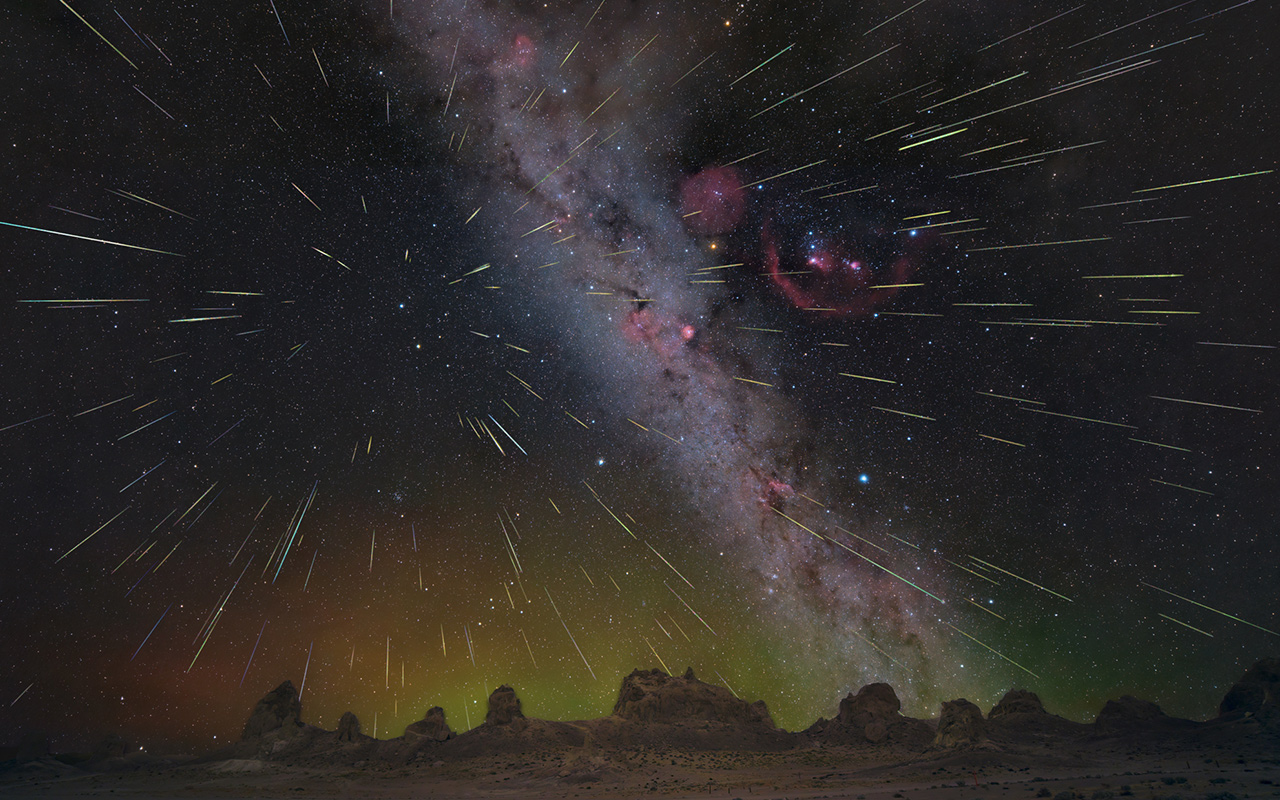Hundreds of Geminid meteors blaze across the night sky above the Trona Pinnacles in California in a composite image from 2023