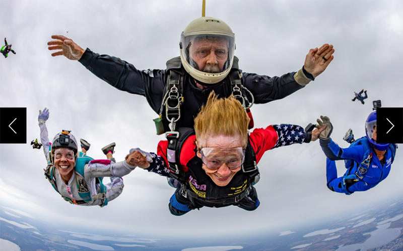 86-year-old Kim Knor completes her 1,000th jump in New Wales, Florida, alongside her two daughters.  